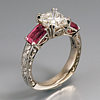 “Dream Cushion” diamond, with vivid hot pink spinels set in 18k white gold hand engraved engagement ring